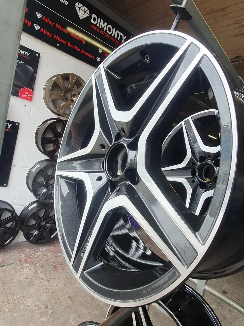 Corroded alloy wheel stripped and refinished by Dimonty Alloys, Wigan