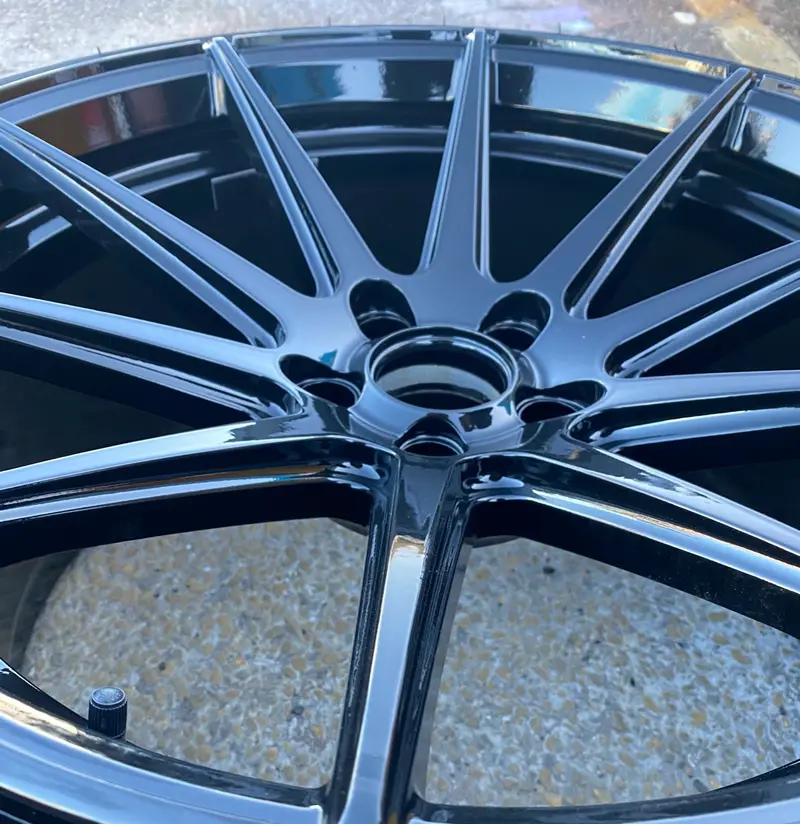 Corroded alloy wheel stripped and refinished by Dimonty Alloys, Wigan