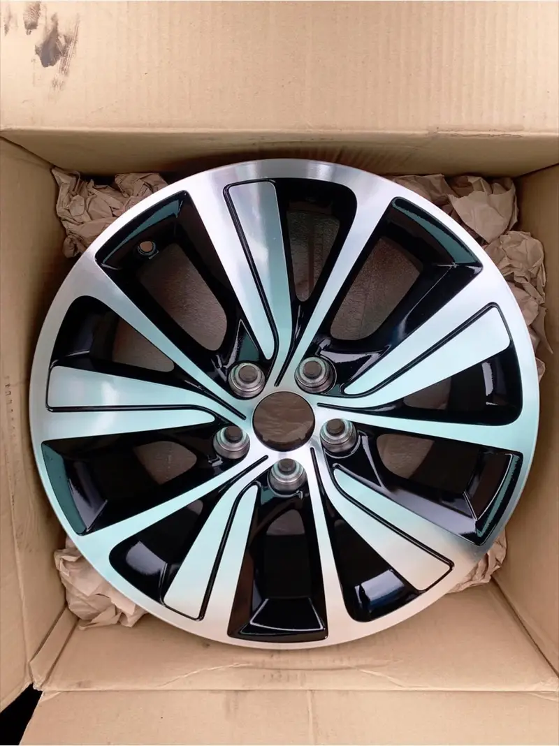 Corroded alloy wheel stripped and refinished by Dimonty Alloys, Wigan