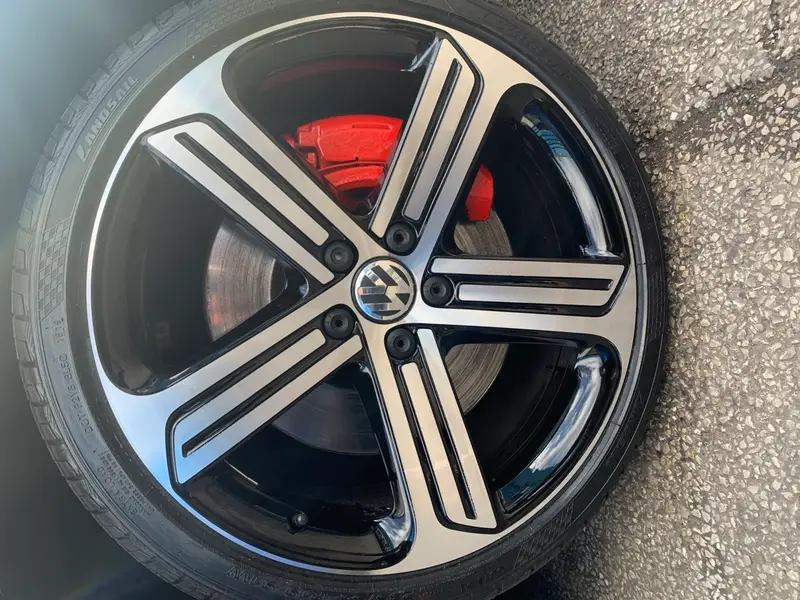 Corroded alloy wheel stripped and refinished by Dimonty Alloys, Wigan
