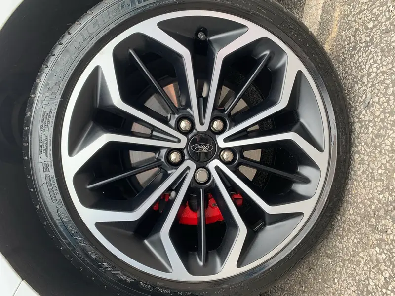 Corroded alloy wheel stripped and refinished by Dimonty Alloys, Wigan