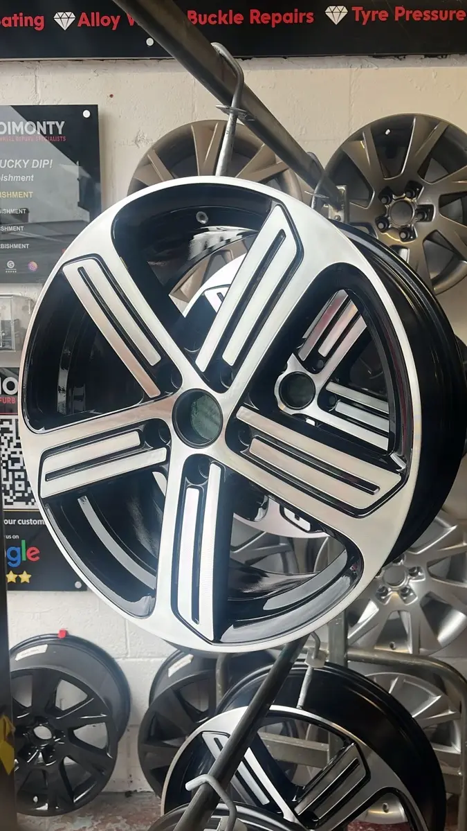 Corroded alloy wheel stripped and refinished by Dimonty Alloys, Wigan