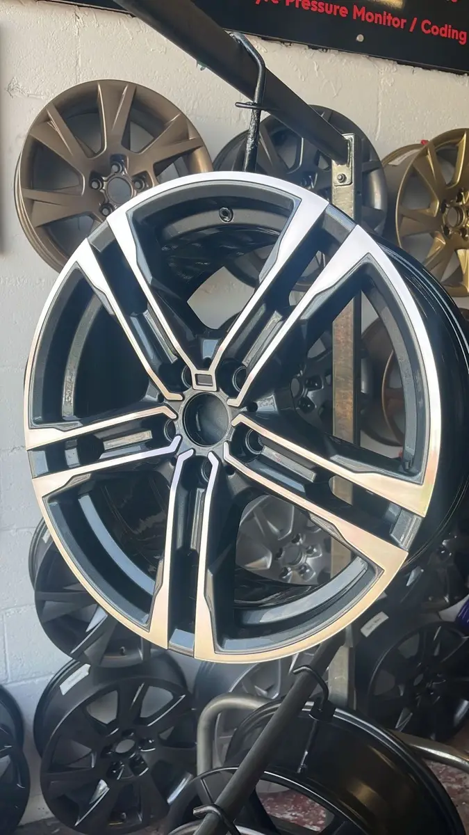 Kerbed alloy wheel restored to a factory finish by Dimonty Alloys